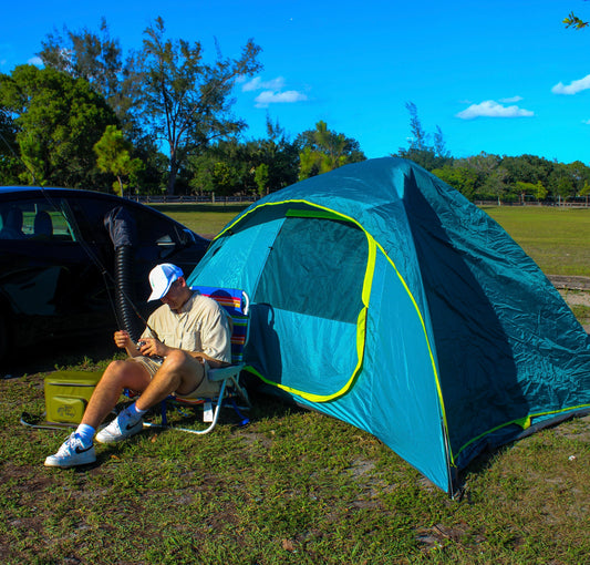 Electric tent with aluminium poles, designed for Tesla Model Y, offering power for camping.